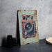 a picture of an old camera on a table
