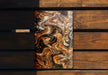 a piece of wood with a marble pattern on it