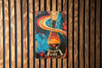 a painting on a wooden wall of a vase