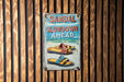 a sign on a wooden wall that says sandal slowdown ahead