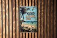 a sign on a wooden wall that says washed ashore here