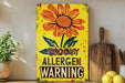 a yellow sign that says groovy allergen warning