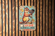 a sign on a wooden wall that says dan good surveillance