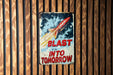 a sign on a wall that says blast into tomorrow