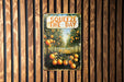 a book about squeeze the day hanging on a wall
