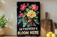a picture of a sign that says inntrovers's bloom here