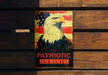 a patriotic sign with an eagle on it
