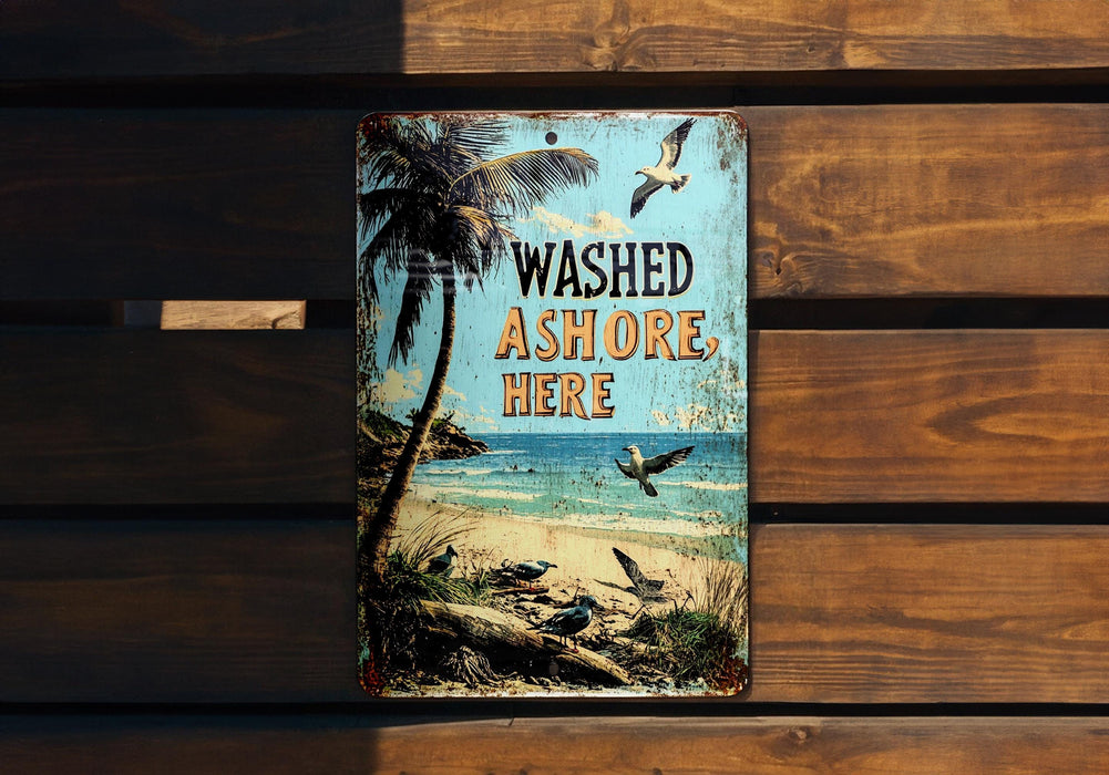 a sign on a wooden bench that says washed ashore here