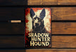a sign on a wooden wall that says shadow hunter hound