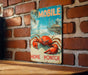 a picture of a crab on a brick wall