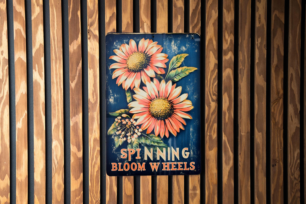 a sign on a wooden wall that says spinning bloom wheels