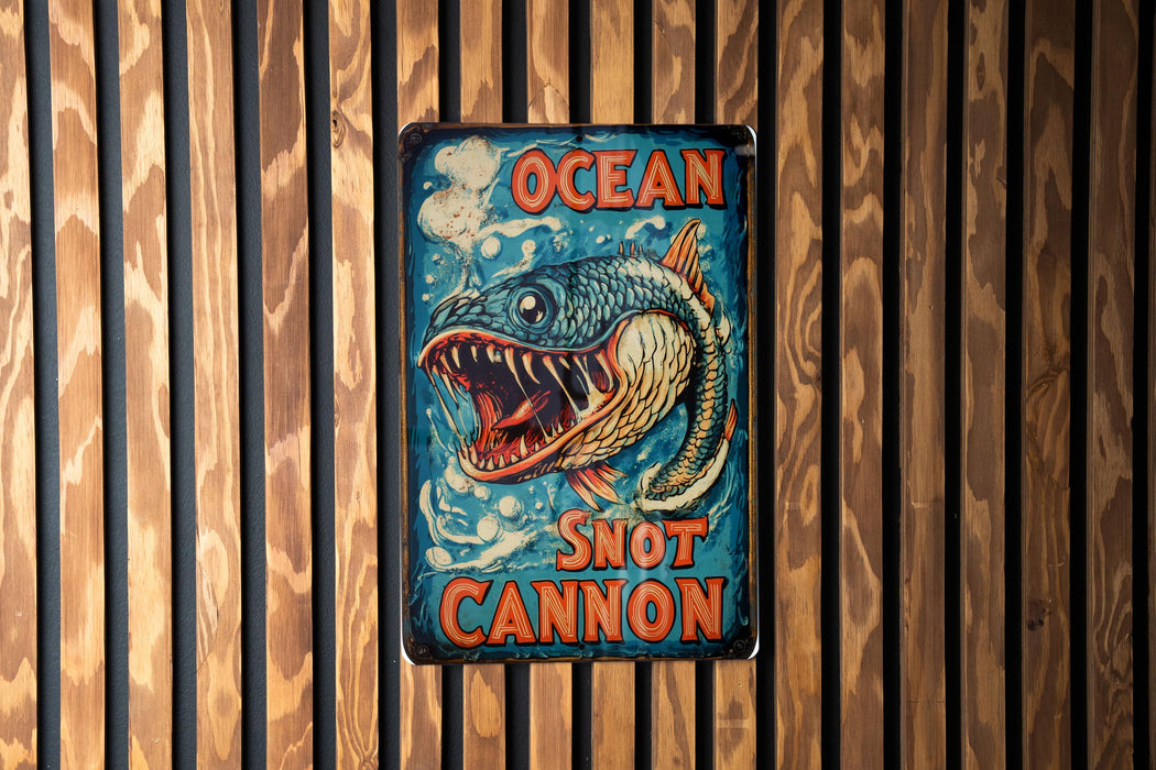 a sign on a wooden wall that says ocean shot cannon