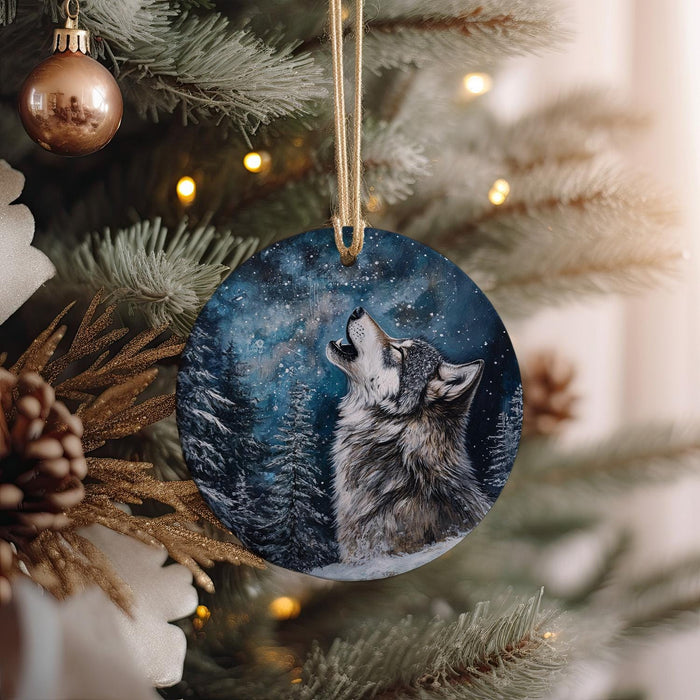 a wolf ornament hanging from a christmas tree