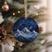 a christmas ornament hanging from a christmas tree