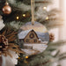 a christmas ornament hanging from a christmas tree