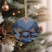 a christmas ornament hanging from a christmas tree