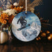 a christmas ornament with a snowboarder on it