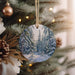 a christmas ornament hanging from a christmas tree
