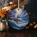 a ceramic ornament with a lighthouse on it