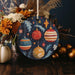 a christmas ornament with ornaments hanging from it