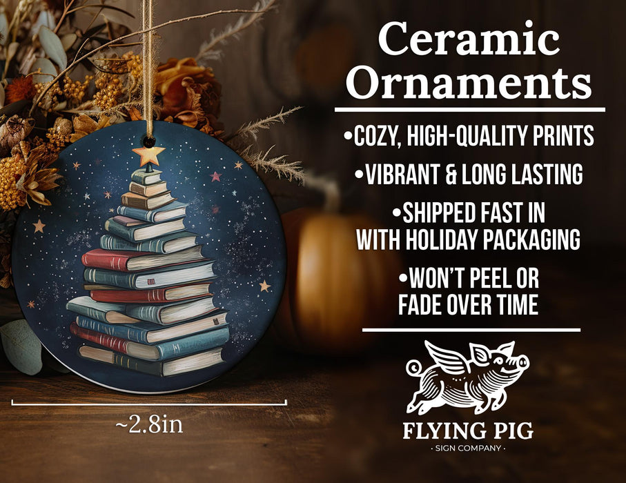 a christmas ornament with a christmas tree made out of books