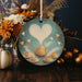 a picture of a teapot with a heart on it