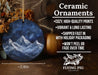 a ceramic ornament with a mountain scene on it