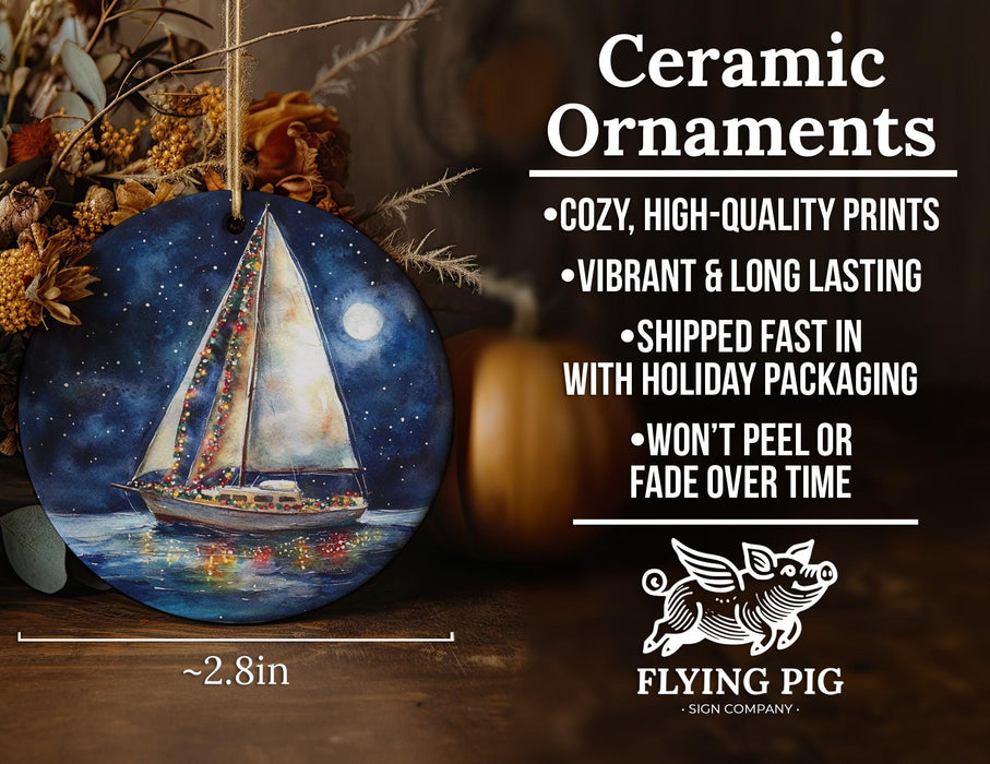 a ceramic ornament with a sailboat on it