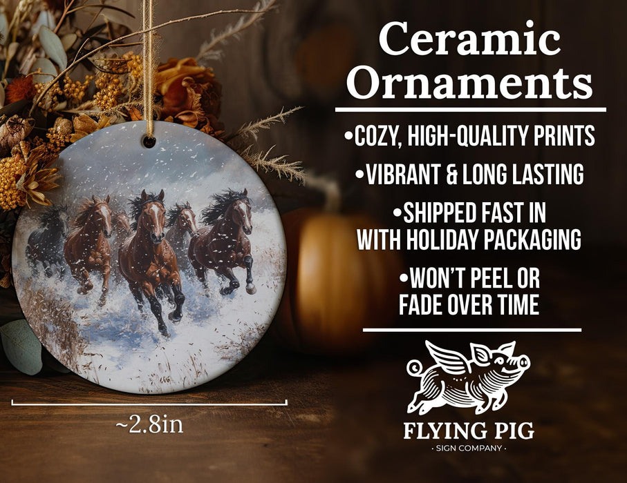 a ceramic ornament with three horses running in the snow