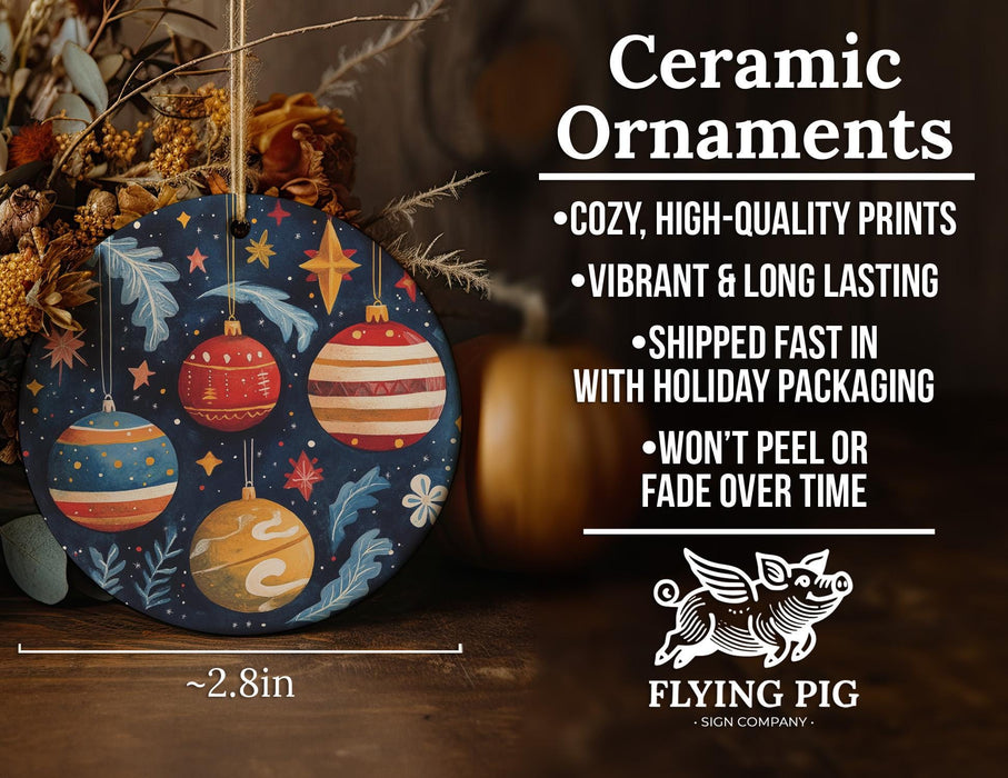 a ceramic ornament on a table next to a pumpkin