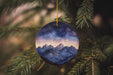 a christmas ornament hanging from a christmas tree
