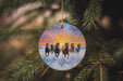 a christmas ornament hanging from a christmas tree