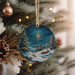 a christmas ornament hanging from a christmas tree
