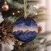 a christmas ornament hanging from a christmas tree