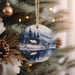 a christmas ornament hanging from a christmas tree