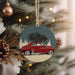 a christmas ornament hanging from a christmas tree