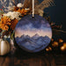 a picture of a mountain range with stars in the sky