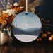 a picture of a full moon hangs on a wall