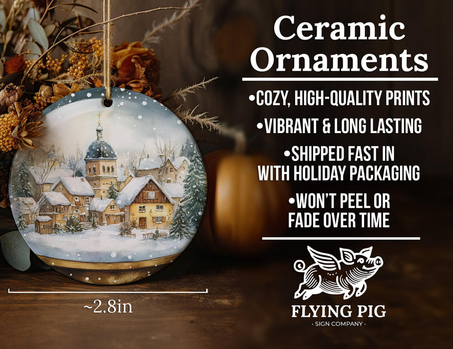 a ceramic ornament with a picture of a house on it