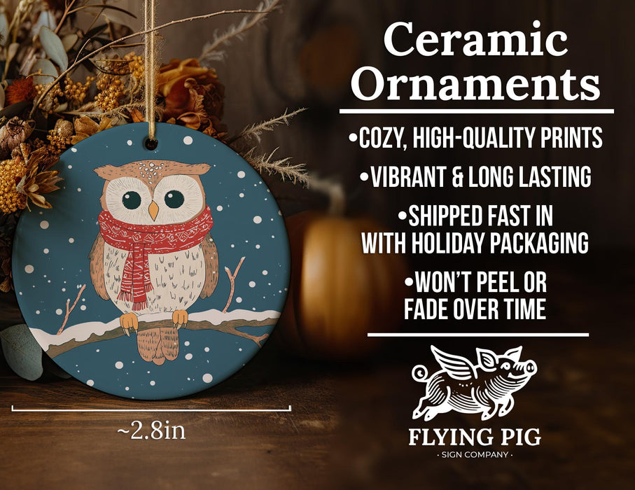 a ceramic ornament with an owl wearing a scarf