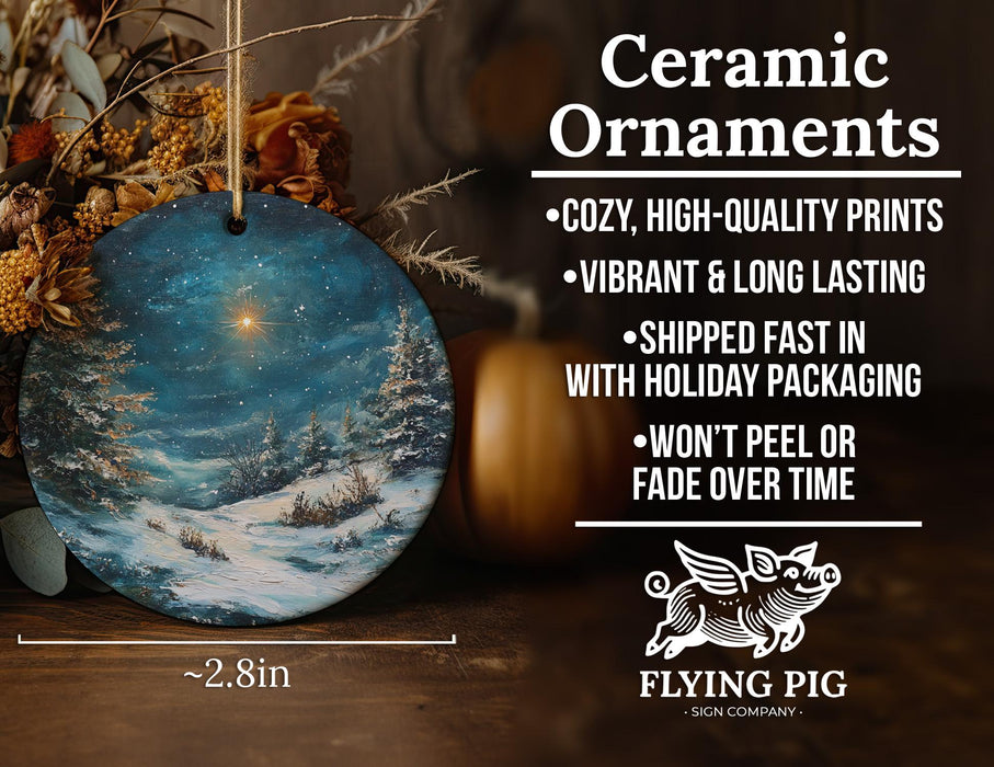 a ceramic ornament with a snowy scene on it