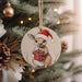 a christmas ornament hanging from a christmas tree
