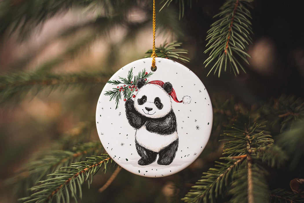 a ceramic ornament hanging from a christmas tree