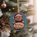 a christmas ornament hanging from a christmas tree