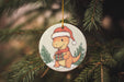 a christmas ornament hanging from a christmas tree