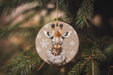 a christmas ornament with a giraffe on it