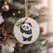a christmas ornament hanging from a christmas tree