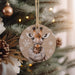 a christmas ornament with a picture of a giraffe