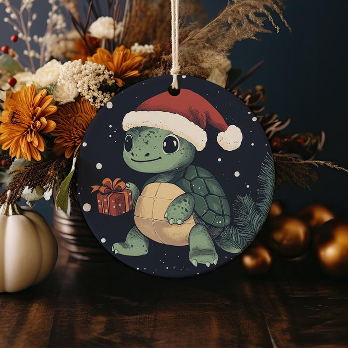 a christmas ornament with a turtle wearing a santa hat