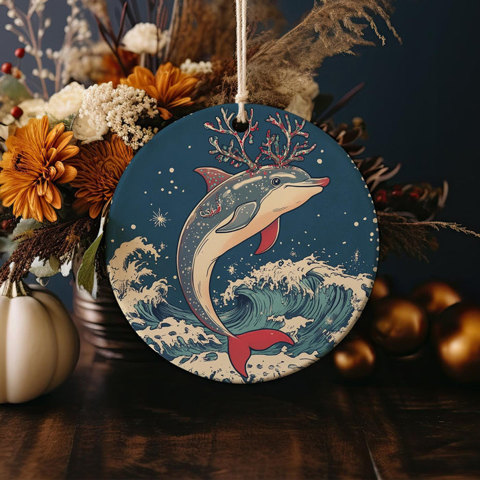 a ceramic ornament with a dolphin on it